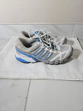 Light Gray and Blue Athletic Adidas Sneakers.